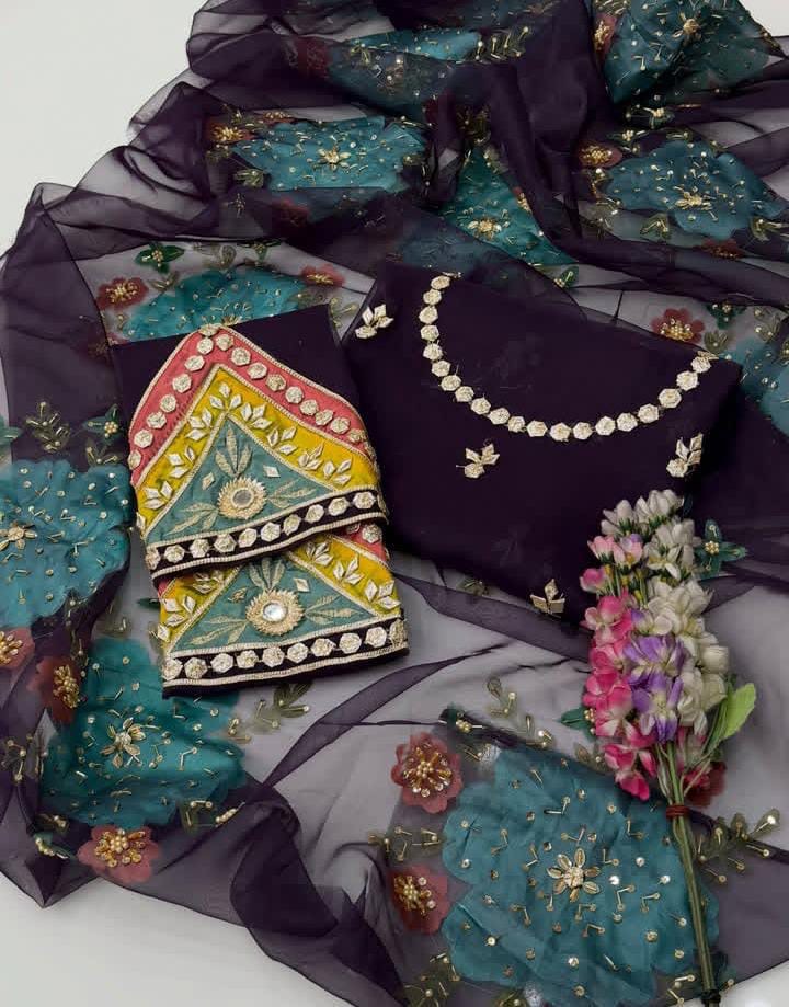 2 PIECE — ORGANZA GOTTA WORK SUIT.